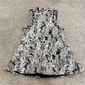 Free people black and white peplum tunic / top